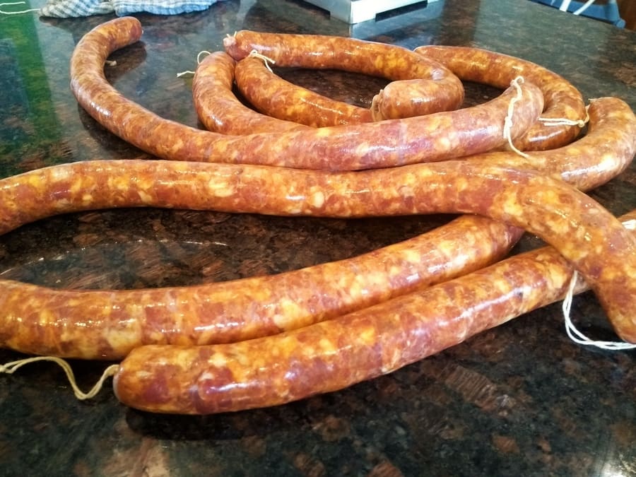 Making salami stuffing pig casings large