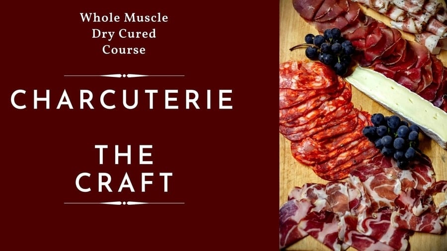 A selection of whole muscle craft cured meats displayed elegantly, showcasing the art of charcuterie.