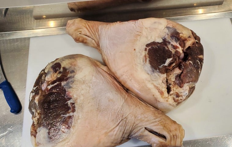 Prosciutto legs after curing and pressing large