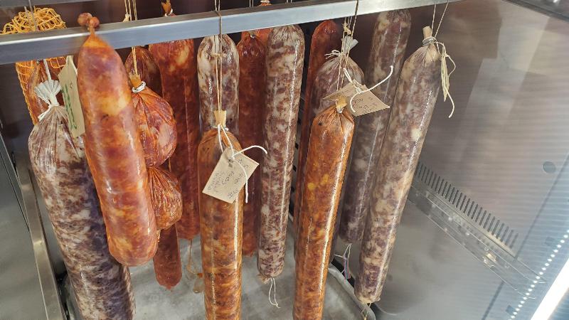 Salami in curing chamber large