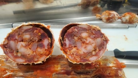 Excessive mold growth, then hardened casing. Salami was not edible.