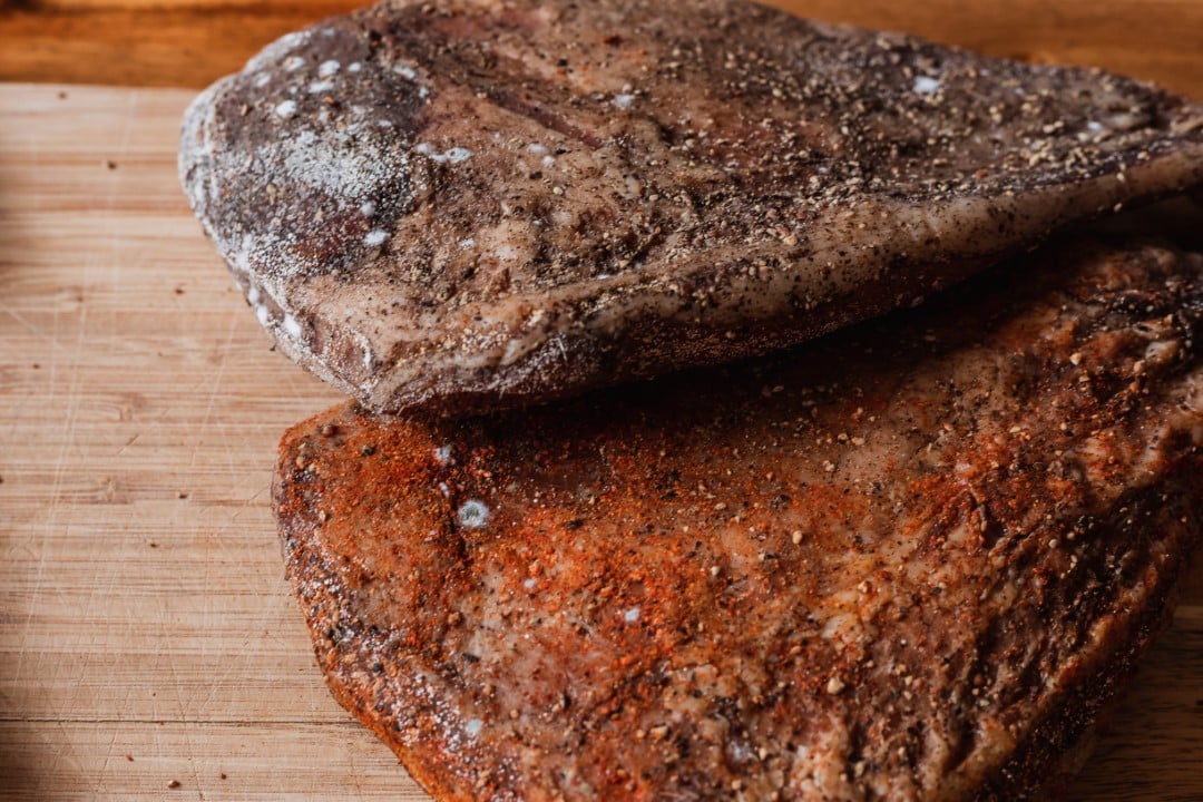 2 muscles of dry cured jowl, known as guanciale.